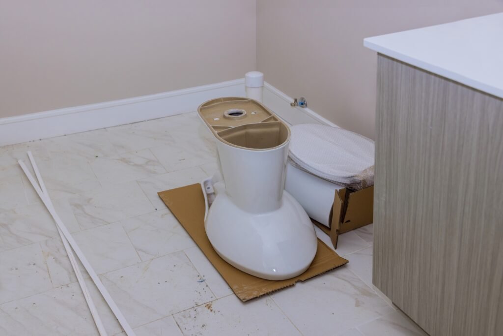 Preparation toilet tank in bathroom plumbing at home changes the repairing toilet tank